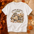 Doing My Best-ish T-Shirt — Cute Raccoon Baking Graphic Tee